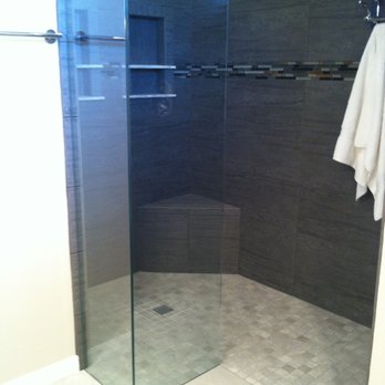 Macik Builders - a shower with a glass door - General Contractors Near Me - Rockledge, Florida Macik Builders - a shower with a glass door - General Contractors Near Me - Rockledge, Florida