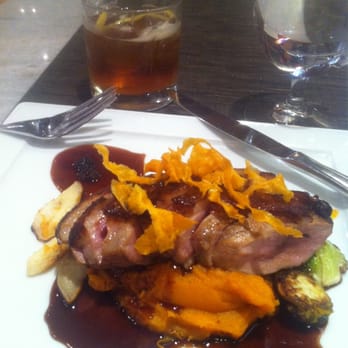 One Flew South - Duck breast w/ sweet potato, brussels sprouts, parsnips, dried blueberry jus. And an old fashioned. - New American Near Me - Atlanta, Georgia