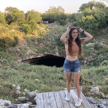 Bracken Bat Cave - My daughter in front of the cave - Local Flavor Near Me - Garden Ridge, Texas