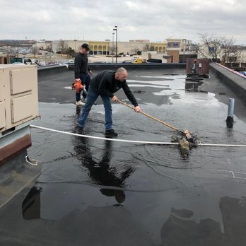 Shane Fisk Roofing - Repairing seams on an EPDM flat roof - Roofing Near Me - Canton, Ohio Shane Fisk Roofing - Repairing seams on an EPDM flat roof - Roofing Near Me - Canton, Ohio
