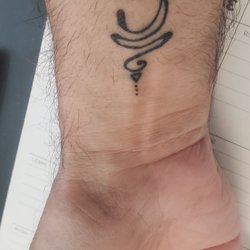 Black Pearl - First ink. Ancient sanscrit symbol for "Breathe."