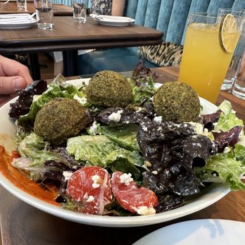 Wilder - House Made Falafel Salad (tahini dressing, feta, cucumber, sun-dried tomato zhug) - Pizza Near Me - Philadelphia, Pennsylvania Wilder - House Made Falafel Salad (tahini dressing, feta, cucumber, sun-dried tomato zhug) - Pizza Near Me - Philadelphia, Pennsylvania
