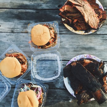 Rollin Smoke BBQ - 3 types of sandwiches, pork ribs, beef ribs, brisket. - @babeswithbbq on Instagram - Barbeque Near Me - Austin, Texas