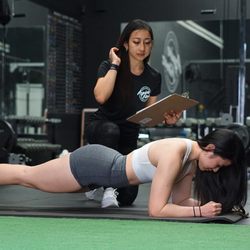 Aspire Fitness Walnut - Our trainer Christy doing what she does best! Attentive, caring, and, most of all, supportive towards any fitness goal.