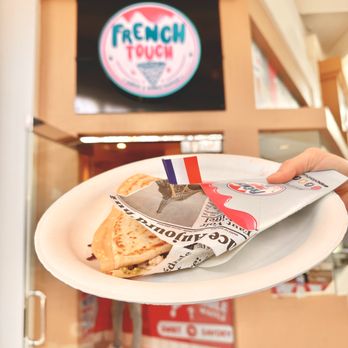 French Touch - person holding a plate of food - Creperies Near Me - Redondo Beach, California French Touch - person holding a plate of food - Creperies Near Me - Redondo Beach, California