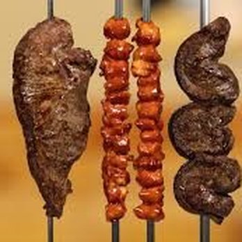 As De Espadas - a row of skewered meats - Brazilian Near Me - San Antonio, Texas
