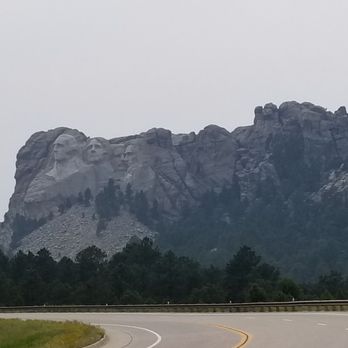 Mount Rushmore National Memorial - Marked vehicle pull over spot permitted to take photos on road leading up to the monument. - Landmarks & Historical Buildings Near Me - Keystone, South Dakota