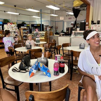 OBX Deli & Cheesesteaks - Another shot of the seating area - Cheesesteaks Near Me - Corolla, North Carolina OBX Deli & Cheesesteaks - Another shot of the seating area - Cheesesteaks Near Me - Corolla, North Carolina