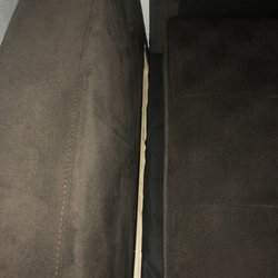 Couch Potato - Side piece that is not fully connected, wiggles and is basically dangling off the side of the "new" sofa.