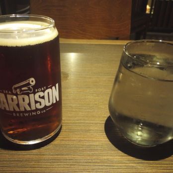 McKelvie's - Garrison Irish Red Ale. $9. And a glass of water, lol. - Seafood Near Me - Halifax, Nova Scotia