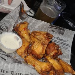 Wojo's Bar and Grill - 50 cent wings on Wednesday's ALL Day!