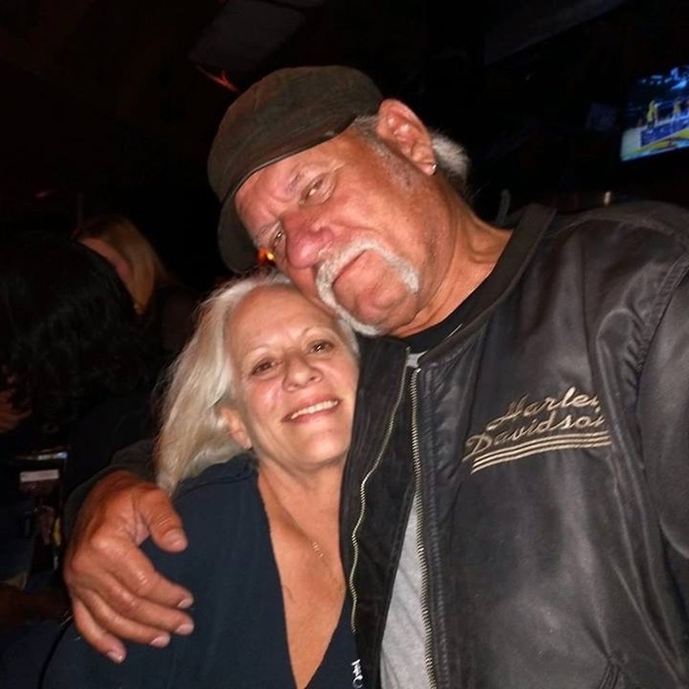 Chopper's Grill - a man and a woman hugging - Bars Near Me - Nashville, Tennessee Chopper's Grill - a man and a woman hugging - Bars Near Me - Nashville, Tennessee