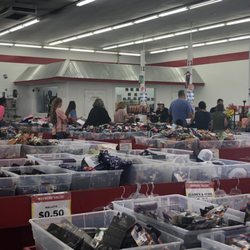 Dirt Cheap - Here we see 2 registers open with about 12 people in line.  Carts full to the brim.  A 10 item or less express check out line is needed.