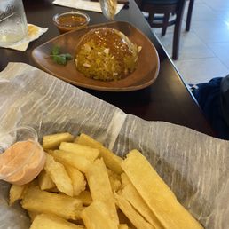 Yuca fries with garlicky chicken mofongo! Yuca fries with garlicky chicken mofongo!