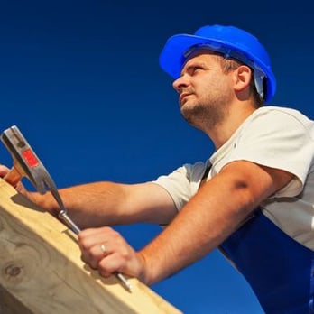 JLS Contracting - a construction worker working on a roof - General Contractors Near Me - Chillicothe, Ohio