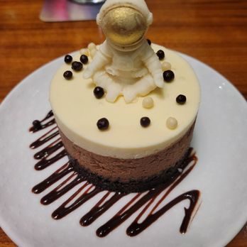 Aurora At The Celeste - Chocolate cake with little white chocolate man - American Near Me - Orlando, Florida