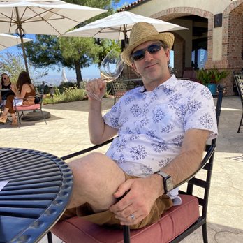 Cal Limo - Birthday boy enjoying a glass of wine. - Limos Near Me Cal Limo - Birthday boy enjoying a glass of wine. - Limos Near Me