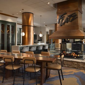 Flatz Restaurant and Lounge - Flatz Lounge, showcasing fireplace and seating - New American Near Me - Broomfield, Colorado Flatz Restaurant and Lounge - Flatz Lounge, showcasing fireplace and seating - New American Near Me - Broomfield, Colorado
