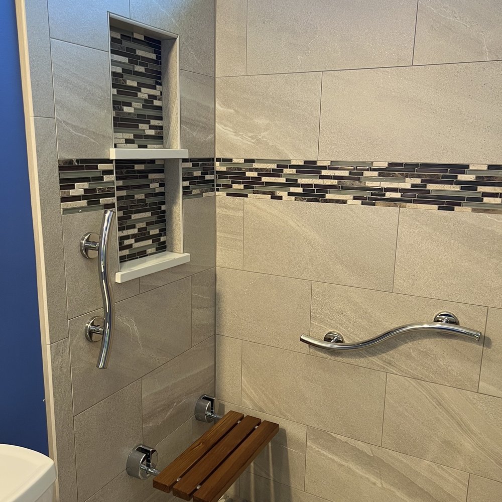 Exquisite Designs Kitchen and Bath Inc - Photo of wall niche in shower seat. - Cabinetry Near Me Exquisite Designs Kitchen and Bath Inc - Photo of wall niche in shower seat. - Cabinetry Near Me