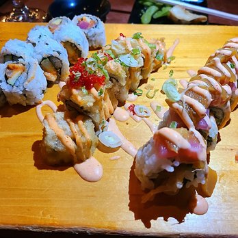 Shakai Sushi Lounge - Happy Hour sushi - left to right - Dynamite roll, Rock & Roll, Mango Madness - $6 each - Lounges Near Me - Orlando, Florida Shakai Sushi Lounge - Happy Hour sushi - left to right - Dynamite roll, Rock & Roll, Mango Madness - $6 each - Lounges Near Me - Orlando, Florida