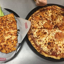 Chuck E. Cheese - Cheese pizza, chicken filled cheese sticks, celery, and ranch and bbq dipping sauces. Really good!