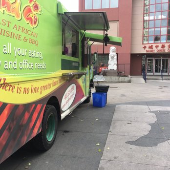 Take It And Go - a food truck parked in front of a building - Food Trucks Near Me - Calgary, Alberta Take It And Go - a food truck parked in front of a building - Food Trucks Near Me - Calgary, Alberta
