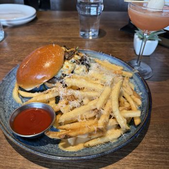 Eureka! - Black and blue mushroom burger with Truffle Cheese Fries and a lychee martini! Delicious!! - American Near Me - Las Vegas, Nevada