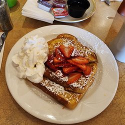5th Avenue Deli & Grill - French toast with fresh strawberries and cream