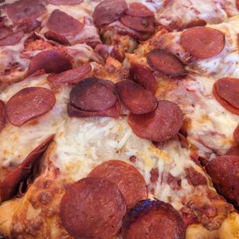 Pizz'A Chicago - Close up of pepperoni pizza - Pizza Near Me - Santa Clara, California Pizz'A Chicago - Close up of pepperoni pizza - Pizza Near Me - Santa Clara, California