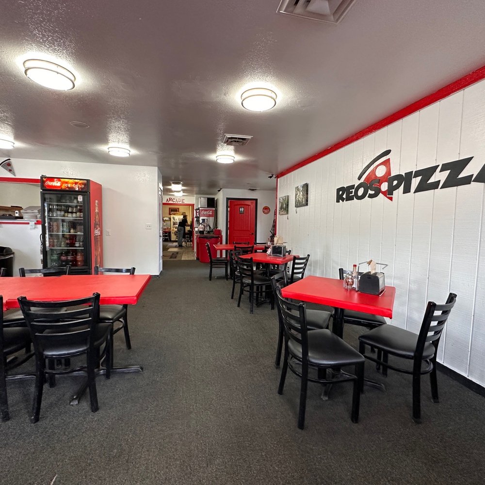 Reo's Pizza - a dining area with tables and chairs - Pizza Near Me - Cascade, Idaho Reo's Pizza - a dining area with tables and chairs - Pizza Near Me - Cascade, Idaho