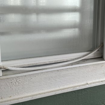 Treasure Realty - Windows in disrepair. - Property Management Near Me