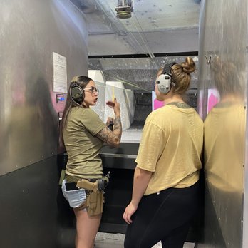 Magnum Range - Erika giving instruction and suggestions to Lauryn down in the range - Gun/Rifle Ranges Near Me - Rancho Cucamonga, California Magnum Range - Erika giving instruction and suggestions to Lauryn down in the range - Gun/Rifle Ranges Near Me - Rancho Cucamonga, California