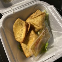a sandwich in a styrofoam container