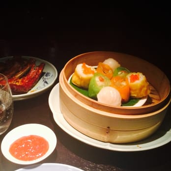 Hakkasan - Dim sum platter: scallop shumai, har gau, Chinese chive dumpling 
and shimeji dumpling (from the £60pp signature menu for two) - Cantonese Near Me - London, XGL