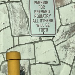 Cute sign in the parking area