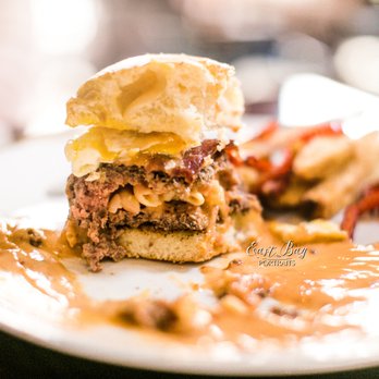 Rebel Kitchen And Libations - The "Hangover" Burger literally is stuffed with Mac n cheese and topped with an egg and bacon... OMG! - American Near Me - Livermore, California Rebel Kitchen And Libations - The "Hangover" Burger literally is stuffed with Mac n cheese and topped with an egg and bacon... OMG! - American Near Me - Livermore, California