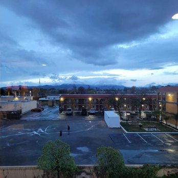 Hampton Inn & Suites Redding - View of hotel next door + fresh snowcapped mountain - Hotels Near Me - Redding, California