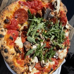 Sleight of Hand Pizza - Arugula, pepperoni, mushrooms, and a bit of truffle oil on red sauce (they ran out of pesto)