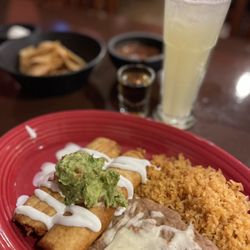 Guadalajara Grill Mexican Restaurant - Chicken flauta dinner and margarita.