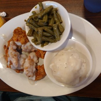 Cottage Inn - Smothered chicken - American Near Me - Louisville, Kentucky