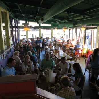 Pinchers - On section of the restaurant near the water. - Seafood Near Me - Naples, Florida