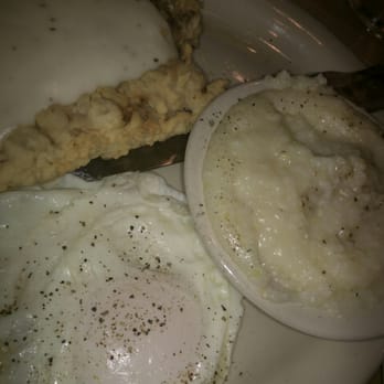 Schobels Restaurant - Chicken fried steak and eggs with grits - Buffets Near Me - Columbus, Texas