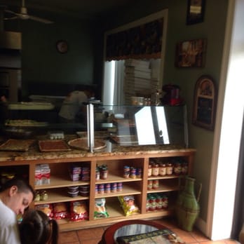 Toscos Italian Delight - a man and two children in a restaurant - Italian Near Me - Red Hill, Pennsylvania