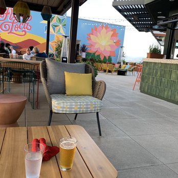 Flora Loca Rooftop Cantina - Bar area. Sitting in one of their couches under heaters. - Mexican Near Me - Oxnard, California