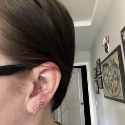 daith piercing and third piercing done by Captive Heart Tattoo!