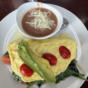 The Breakfast Mug - Caprese Omelette with a side of refried beans. - Breakfast & Brunch Near Me - Oceanside, California The Breakfast Mug - Caprese Omelette with a side of refried beans. - Breakfast & Brunch Near Me - Oceanside, California
