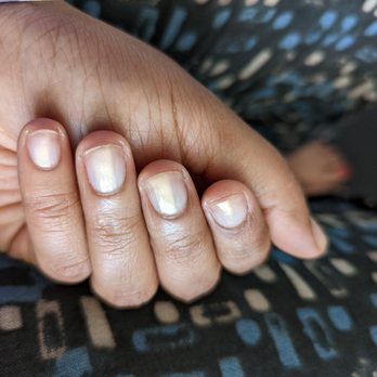The Nail Hall - Neatly filed nails with a light nail paint that is dual colored, white with a touch of gold! My favorite! - Nail Salons Near Me - San Francisco, California
