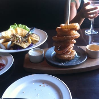 Yard House - Onion rings are awesome probably the best I've ever had as well as the mushroom lettuce wraps - New American Near Me - Oxnard, California Yard House - Onion rings are awesome probably the best I've ever had as well as the mushroom lettuce wraps - New American Near Me - Oxnard, California