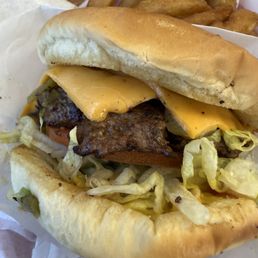 Green chile cheese burger and onion rings