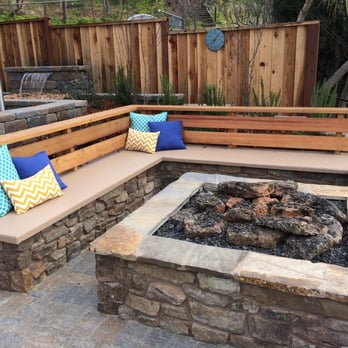 Larson Landscape - custom firepit with cedar wood and masonry bench - Landscaping Near Me - San Jose, California Larson Landscape - custom firepit with cedar wood and masonry bench - Landscaping Near Me - San Jose, California